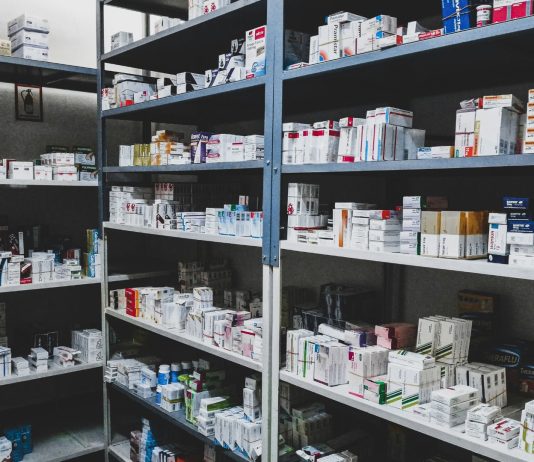 pharmacy shelves filled with medicine